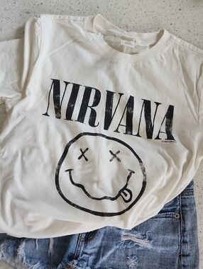 NIRVANA Off-White Tee with Black Logo and Smiley Graphic